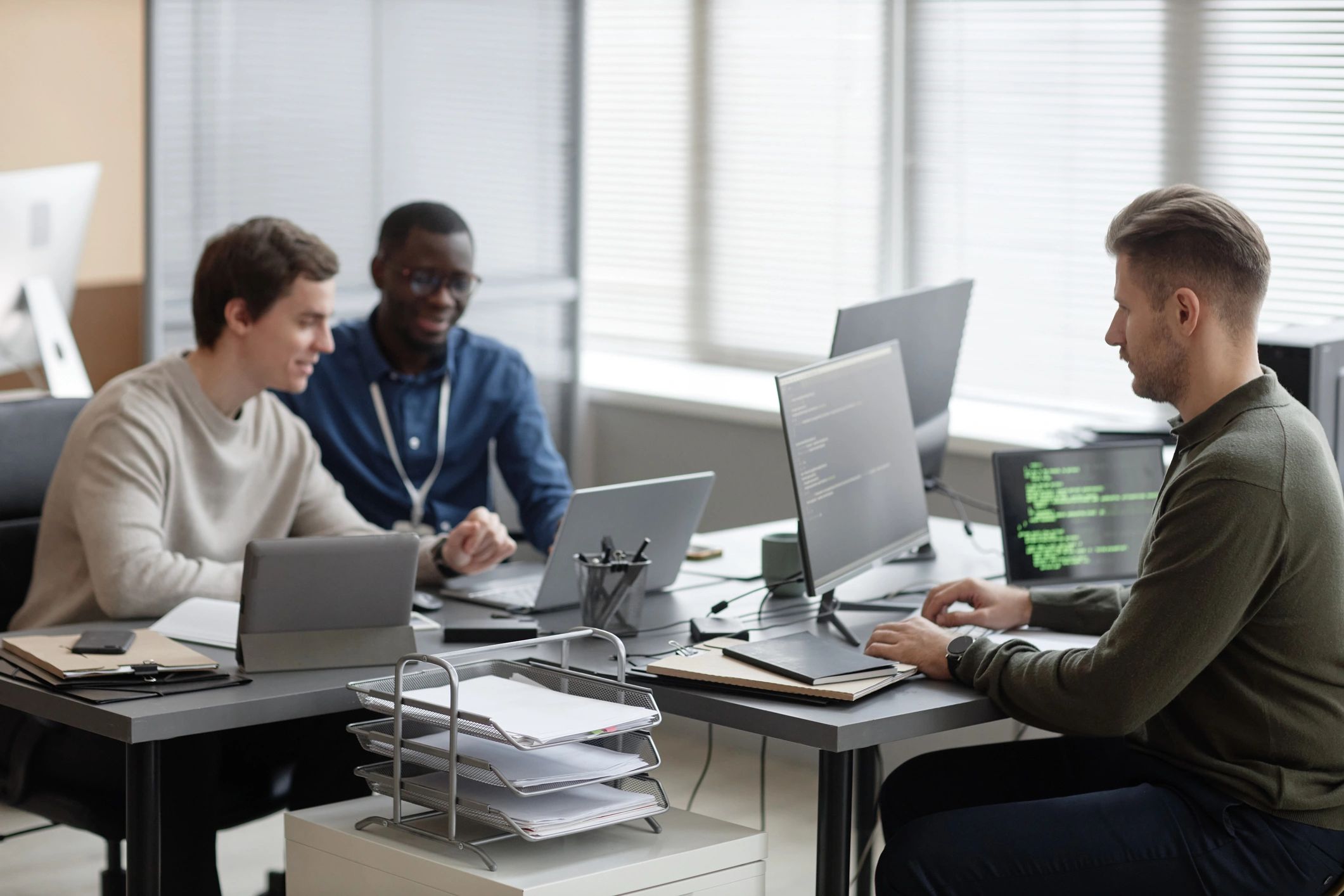 Technology team working together in an enterprise office