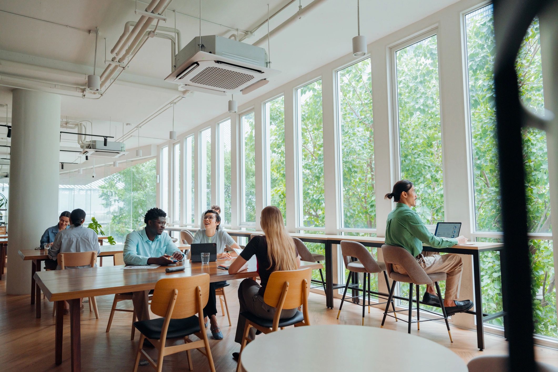 Diverse professionals working together in a modern coworking space